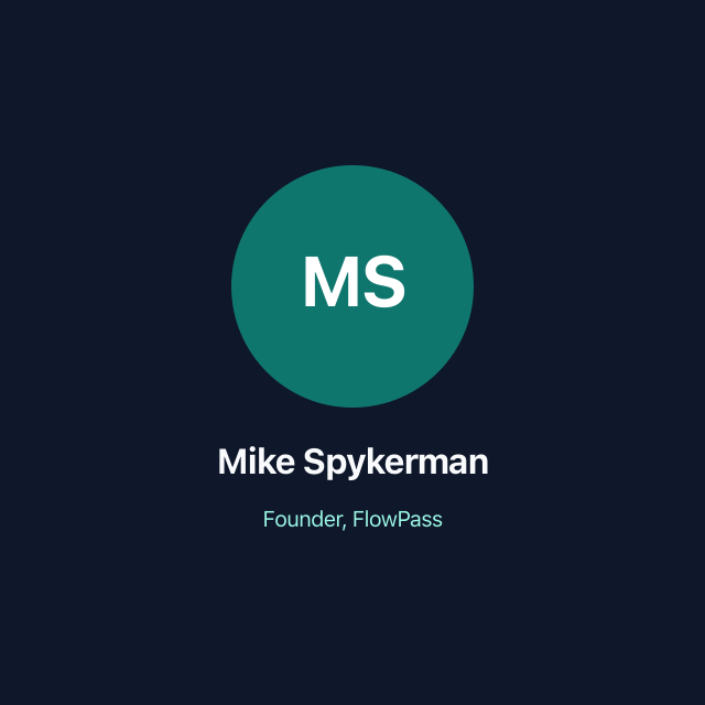Portrait of Mike Spykerman, founder of FlowPass, wearing a branded studio-navy shirt.